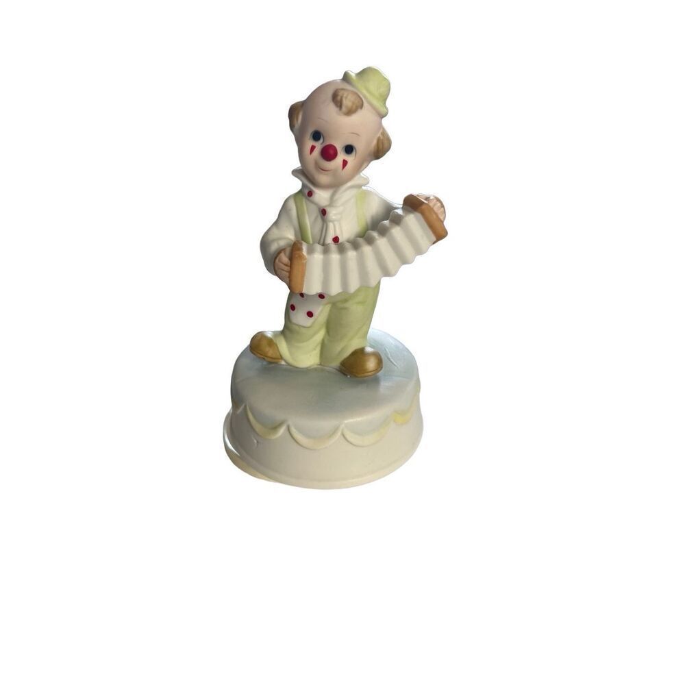 Vintage Artmark rotating accordion playing clown figurine